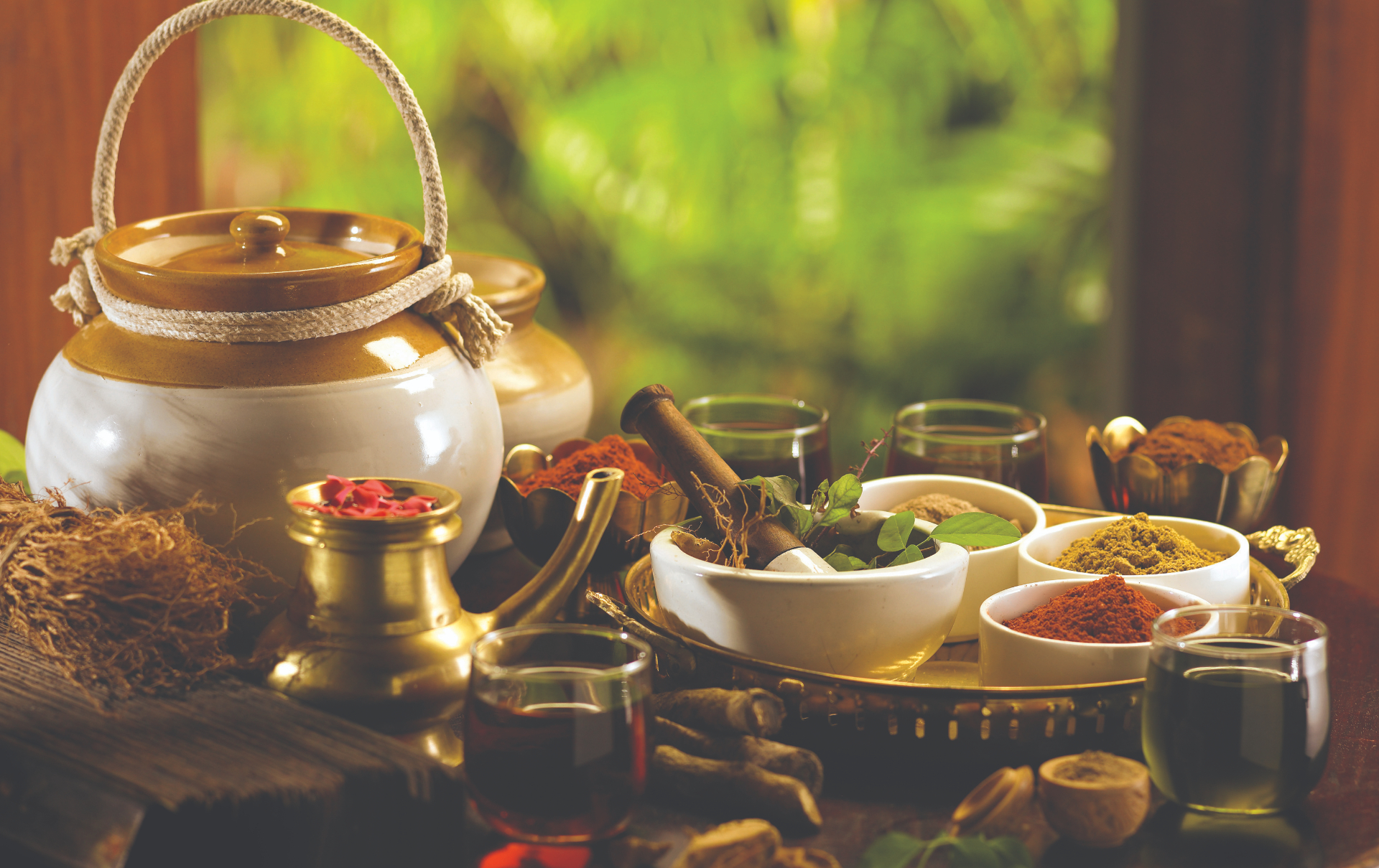 Ayurvedic herbs, brass vessels and rose petals